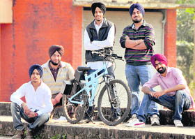 Students of Guru Nanak College of Engineering pose with the bicycle they have designed.