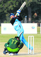 Indian blind cricketer Prakash Jayaramaiah (R) plays a shot during the first international T20 match against Pakistan in Lahore on Friday. Pakistan beat India by 71 runs