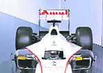 Amul in its distinctive font written across the rear wing of the Ferrari