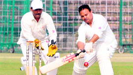 Players in action during the Chandigarh Inter-Department T-20 Cricket Tournament at the cricket stadium in Sector 16, Chandigarh.