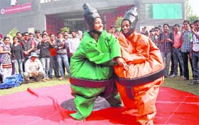 Girls participate in a fun game during the tech fest at the LPU on Saturday