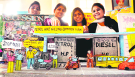 Students at an exhibition on Scanning of business world at Khalsa College for Women in Ludhiana.
