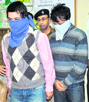 Vikram Sharma and Vinay Chadha at the Police Headquarters in Sector 9 of Chandigarh on Sunday. 