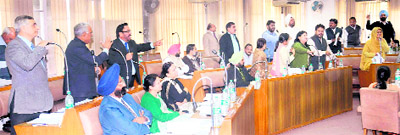 Municipal councillors exchange hot words during a General House meeting in Chandigarh.