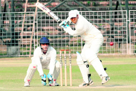 A batsman plays a shot during a cricket match in Chandigarh on Sunday.