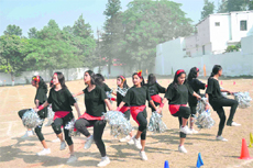 Girl students display aerobic skills during the annual day of the senior wing of Doon International School in Dehradun on Sunday.