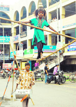 I want to go to school: A young girl displays daredevil skills to earn a livelihood for her family in Amritsar