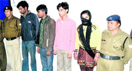 The suspects in an abduction case in the police custody in Haridwar on Monday.