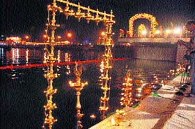 The reflection of decorated pooja sthals in the Brahma Sarovar, Kurukshetra, on the occasion of the Kurukshetra Utsav Gita Jayanti Samaroh held last year