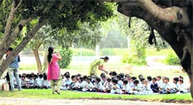 Schoolchildren enjoy picnic at Leisure Valley park in Gurgaon