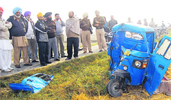 The mangled remains of the tempo that was hit by a school bus at Pholidiwal village near Jalandhar