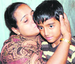 The rescued child, Damanpreet, with his mother in Amritsar 