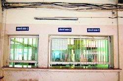 The windows of registry clerks lie vacant as the ministerial staff go on strike in Amritsar 