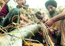 The damaged phone cables near Phase 3, Mohali.
