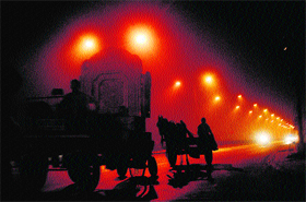 Fog envelops the Chandigarh-Zirakpur road, reducing visibility to almost zero at night.
