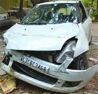 A car at the police station which fell off from the flyover in Defence Colony, New Delhi, on Monday