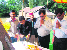 Raghunath Rana, chairman, Medium Industry Development Board, Punjab, pays tributes to martyr Wazir Ram Singh Pathania at Bassa Waziran village in Nurpur. 
