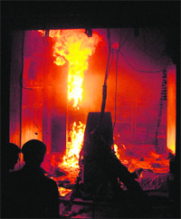 A cloth house was gutted in a fire on Monday night at Peer Bodla Bazaar. Owners of the shop Bittu Sobti and Pardeep Sobti said when they reached the spot, they saw smoke billowing from the shop.