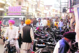 Vehicles caught in a traffic jam on the Lajpat Rai Road at Jagraon