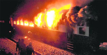 Two AC coaches of the Howrah-Dehradun Express engulfed in flames in Giridih district of Jharkhand on Tuesday.
