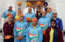 The Indian womens kabaddi team with Jathedar Balwant Singh Nandgarh during a visit to the Takht Damdama Sahib at Talwandi Sabo on Wednesday after lifting the World Kabaddi Cup