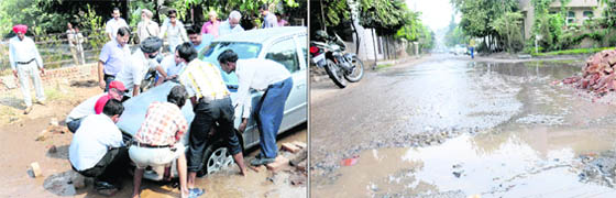 Residents of Sector 44-B pull out a car stuck in a puddle, resulting from a leaking pipeline which had been dug up to supply water to an adjoining park; (right) More than a fortnight later, movement is almost impossible in the area, left uncared for by the authorities concerned.
