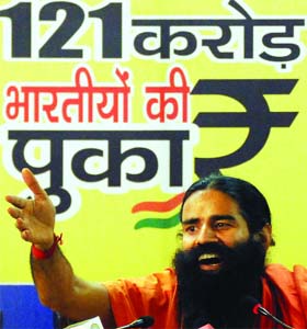 Baba Ramdev addresses a press conference in New Delhi on Wednesday