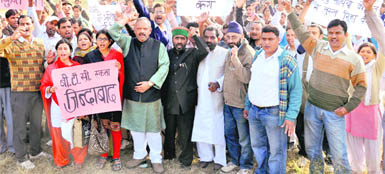 BTC teachers hold a demonstration at the Parade Ground in Dehradun on Wednesday. 