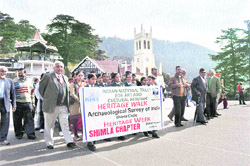 Schoolchildren take part in a heritage walk organised by the Indian National Trust for Art and Cultural Heritage in Shimla