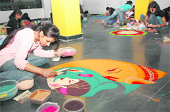 Students make rangolis at the North-Zone Youth Festival Virsa in Lovely Professional University