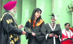 Vice-Chancellor Dr Baldev Singh Dhillon (left) awards a degree to a student during the PAU convocation in Ludhiana on Wednesday.