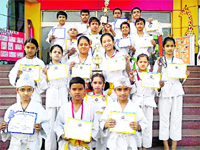 Winners of Spring Dale Senior Secondary Public School strike a pose with their medals and certificates in Ludhiana. 