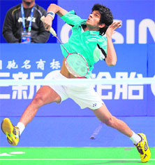 Indias Ajay Jayaram hits a return during the China Open in Shanghai on Wednesday. 