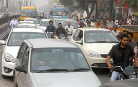 Congestion slows down the movement of vehicles on a road near Fauji Chowk in Bathinda on Thursday