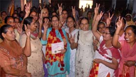 The president of the All Punjab Anganwari Mulazam Union, Hargobind Kaur (centre), after being honoured by the district unit of the union in Bathinda on Thursday