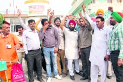 BJP workers protest against ticket allotment in front of the party office at Sector 33 in Chandigarh on Thursday