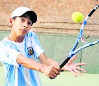 Param Pun returns a shot during a match of the CLTA-AITA Championship Series in Sector 10, Chandigarh, on Thursday