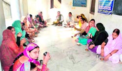 Devotees partake of langar at Gol Gurdwara in Jwalapur,Haridwar, on Thursday