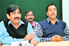 Representatives of the Officers-Employees Joint Coordination Committee of the Uttarakhand Peyjal Nigam address mediapersons in Dehradun on Thursday. 