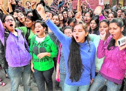 MCM students stage a protest outside the principals office in Chandigarh