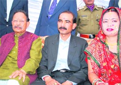 Chief Minister BC Khanduri with Ajay Tamta, BJP legislator, and his wife at Someshwar in Almora district on Friday