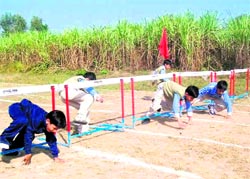 Children participate in the annual sports meet of Bachpan Play School and Academic Heights in Haridwar on Thursday