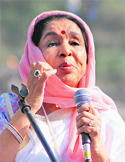 Asha Bhosle performs at the inaugural ceremony.
