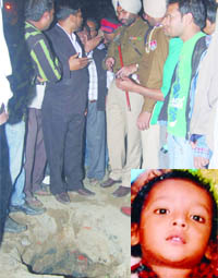 The police officials and civilians search the manhole after Sagar (inset) fell down in a manhole at Kutcha Kot in Jalandhar on Friday. 