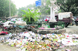 Garbage piled up at Plaza Chowk on the Old GT Road in Jalandhar