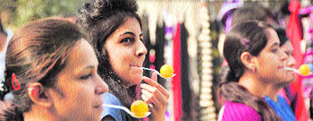 Girls participate in a spoon race competition during the fun day at INIFD, Ludhiana, on Friday.