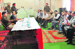 ACP Swapan Sharma interects with residents during his police-public meeting in Ludhiana on Friday. 