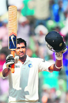Ravichandran Ashwin celebrates after scoring a century in the third Test against West Indies in Mumbai on Friday. 
