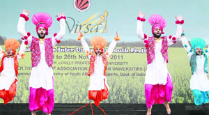 Students perform bhangra during Virsa at Lovely Professional University near Jalandhar. 