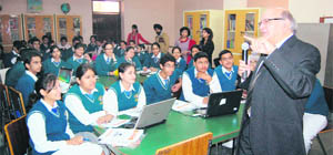 Prof MM Pant, Pro Vice-Chancellor of IGNOU, addresses students during a workshop on Cambridge Advanced English Test at DAV International School in Amritsar on Saturday. 